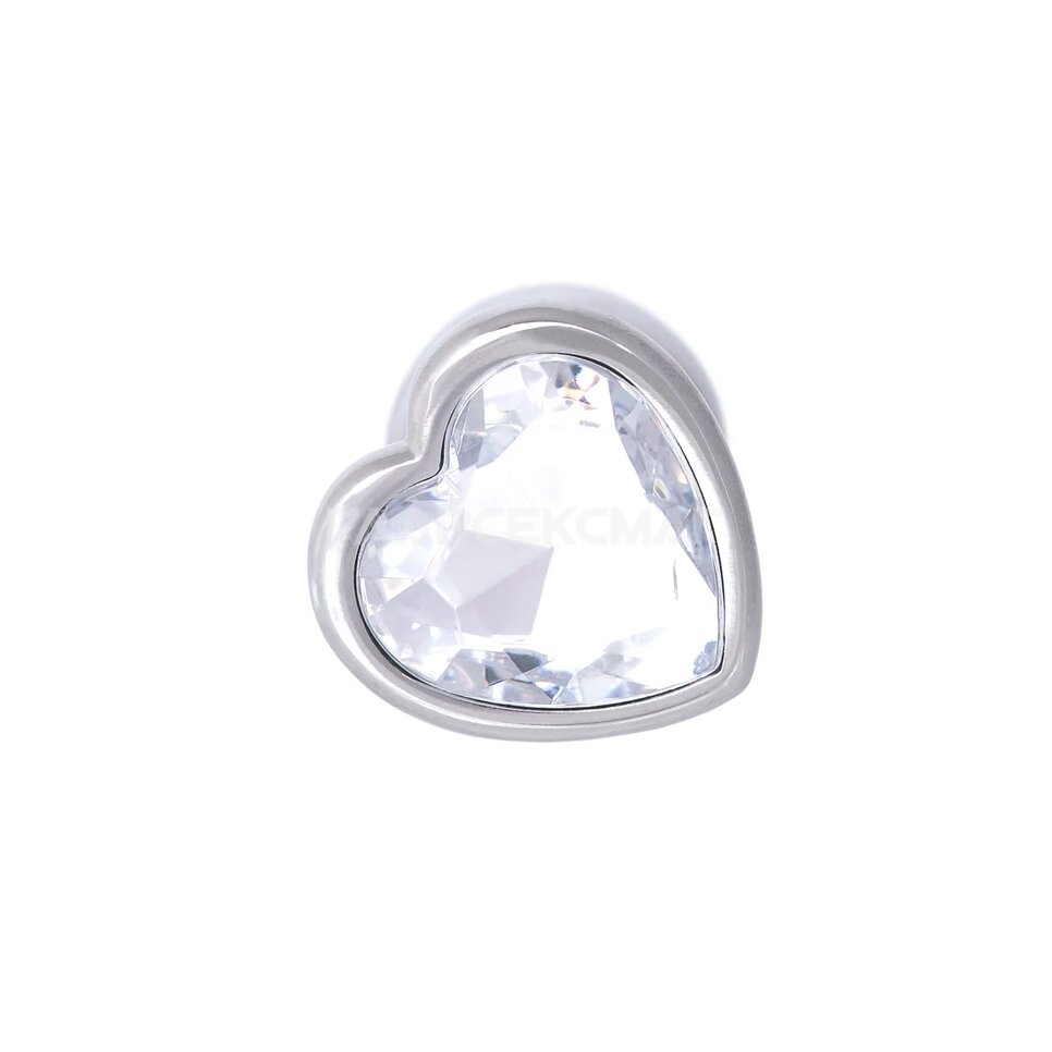 Серебристая анальная пробка с прозрачным кристаллом-сердцем - 7 см.
